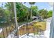 View of a backyard oasis, showcasing lush greenery and a charming outdoor cabana at 1159 Magnolia Ave, Daytona Beach, FL 32114