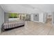 Basement room with tile floor and sliding glass doors at 1159 Magnolia Ave, Daytona Beach, FL 32114