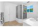 Bathroom featuring shower with glass doors and white vanity at 1159 Magnolia Ave, Daytona Beach, FL 32114