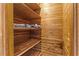 Wood-lined closet with shelves provides an organized storage solution at 1159 Magnolia Ave, Daytona Beach, FL 32114