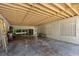 Spacious garage with a lattice wall and sliding glass doors to the outside at 1159 Magnolia Ave, Daytona Beach, FL 32114