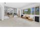 Open-concept living room showcasing unique architectural details and a glimpse into adjacent dining area at 1159 Magnolia Ave, Daytona Beach, FL 32114
