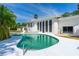 Private pool with patio, sleek lounge furniture, and elegant home architecture at 1159 Magnolia Ave, Daytona Beach, FL 32114