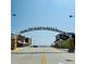 Entrance sign to the 'World's Most Famous Beach' with beach views in the background at 1159 Magnolia Ave, Daytona Beach, FL 32114
