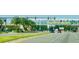 Daytona Beach entrance with palm trees and modern design, welcoming visitors at 1159 Magnolia Ave, Daytona Beach, FL 32114