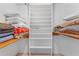 The walk-in closet boasts ample shelving and storage for an organized wardrobe at 1159 Magnolia Ave, Daytona Beach, FL 32114