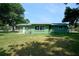 Green house with large backyard at 1301 Oakwood Ave, Daytona Beach, FL 32114