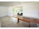 Spacious open-concept room featuring gray flooring and abundant natural light at 1301 Oakwood Ave, Daytona Beach, FL 32114