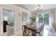 Dining room with chandelier and view of bedroom at 1465 Admrial Nimitz Ave, Daytona Beach, FL 32124