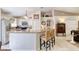 Kitchen with island seating, stainless steel appliances, and tile flooring at 1465 Admrial Nimitz Ave, Daytona Beach, FL 32124