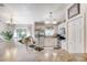Bright open concept kitchen with stainless appliances, stone counters and tile floors at 1465 Admrial Nimitz Ave, Daytona Beach, FL 32124
