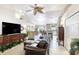 Spacious living area leading to kitchen, featuring tile floors and open floor plan at 1465 Admrial Nimitz Ave, Daytona Beach, FL 32124