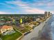 Charming beach home with a pristine lawn, close proximity to the beach, and nearby amenities at 1504 N Atlantic Ave, Daytona Beach, FL 32118