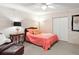 Comfortable bedroom featuring a bed, side table, and a closet, creating a peaceful retreat at 1504 N Atlantic Ave, Daytona Beach, FL 32118