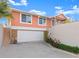 Two-story home with a two-car garage offers a blend of comfort and privacy at 1504 N Atlantic Ave, Daytona Beach, FL 32118
