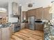 Modern kitchen features stainless steel appliances, granite countertops, and ample cabinet space at 1504 N Atlantic Ave, Daytona Beach, FL 32118