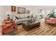 Spacious living room showcases stylish furniture, light hardwood floors, and bright natural light at 1504 N Atlantic Ave, Daytona Beach, FL 32118