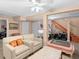 Cozy living room area with seating and neutral walls, ready for relaxation and entertainment at 1504 N Atlantic Ave, Daytona Beach, FL 32118