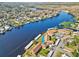 Gorgeous aerial view of the waterway highlighting the community's location and the boat docks available for residents at 1640 Juno Trl # 105D, Astor, FL 32102