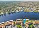 Aerial view of community, river, and surrounding area, showing docks and the waterfront location at 1640 Juno Trl # 105D, Astor, FL 32102