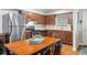 Updated kitchen with stainless steel appliances, granite countertops, and shaker style cabinets offer modern elegance at 1640 Juno Trl # 105D, Astor, FL 32102
