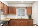 Updated kitchen with stainless steel stove, oven, dishwasher and granite countertops perfect for cooking at 1640 Juno Trl # 105D, Astor, FL 32102