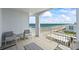 Relax on this beautiful arched balcony with chairs and a stunning ocean view at 2071 S Atlantic Ave # 1005, Daytona Beach Shores, FL 32118
