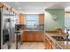 Open concept kitchen featuring granite countertops, stainless steel appliances and a beautiful ocean view at 2071 S Atlantic Ave # 1005, Daytona Beach Shores, FL 32118