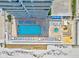 Aerial shot of a pristine pool and lounge area, complete with beach access and plenty of seating at 2071 S Atlantic Ave # 1005, Daytona Beach Shores, FL 32118