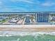 Stunning aerial view of beachfront condos with ocean views and pristine sandy beach at 2071 S Atlantic Ave # 1005, Daytona Beach Shores, FL 32118