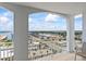 Relax on this balcony with a view of the city, beach, and ocean at 2071 S Atlantic Ave # 1005, Daytona Beach Shores, FL 32118
