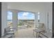 Enjoy city and ocean views from this spacious balcony with seating for outdoor enjoyment at 2071 S Atlantic Ave # 1005, Daytona Beach Shores, FL 32118