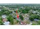 Aerial view showcases home among mature trees, highlighting the community's beautiful landscape at 241 Sanchez Ave, Ormond Beach, FL 32174