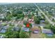 Aerial view of home, surrounded by trees, in established neighborhood at 241 Sanchez Ave, Ormond Beach, FL 32174