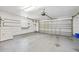 The garage features a metal roll-up door and includes a washing machine hookup at 241 Sanchez Ave, Ormond Beach, FL 32174