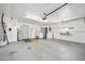 Spacious garage with utility sink, laundry area, and side door access to the property at 241 Sanchez Ave, Ormond Beach, FL 32174