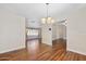 The living room features wood floors and connects to other rooms in the home at 241 Sanchez Ave, Ormond Beach, FL 32174