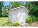 Backyard shed that offers extra storage and potential workshop space at 241 Sanchez Ave, Ormond Beach, FL 32174