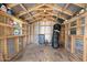 Spacious shed with wooden shelving providing ample storage for tools and equipment at 241 Sanchez Ave, Ormond Beach, FL 32174