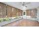 Sunroom filled with natural light, tile flooring, and a ceiling fan at 241 Sanchez Ave, Ormond Beach, FL 32174
