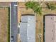 Aerial view of the home showing the roof, driveway, and surrounding landscape at 244 Oakleigh Dr # 200, Deland, FL 32724