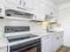 Clean kitchen offering modern appliances and ample counter space at 244 Oakleigh Dr # 200, Deland, FL 32724