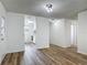 Inviting living room featuring modern floors and updated lighting fixtures at 244 Oakleigh Dr # 200, Deland, FL 32724