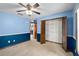 Cozy bedroom with neutral carpet and ample closet space at 2468 Scottville Ave, Deltona, FL 32725