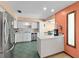 Bright kitchen features stainless steel appliances, ample counter space, and easy access to the breakfast nook at 2468 Scottville Ave, Deltona, FL 32725