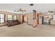 Inviting open-concept living room flows seamlessly into the kitchen at 2468 Scottville Ave, Deltona, FL 32725