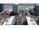 Aerial view highlighting oceanfront condos with parking and beach access at 2727 N Atlantic Ave # 602, Daytona Beach, FL 32118