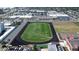Overhead view of the athletic field with tennis courts and parking available at 2727 N Atlantic Ave # 602, Daytona Beach, FL 32118