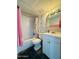 Bathroom featuring a shower and tub combination with a single sink vanity at 2727 N Atlantic Ave # 602, Daytona Beach, FL 32118