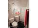Cozy bathroom featuring a tiled shower, a standard toilet, and a white vanity at 2727 N Atlantic Ave # 602, Daytona Beach, FL 32118